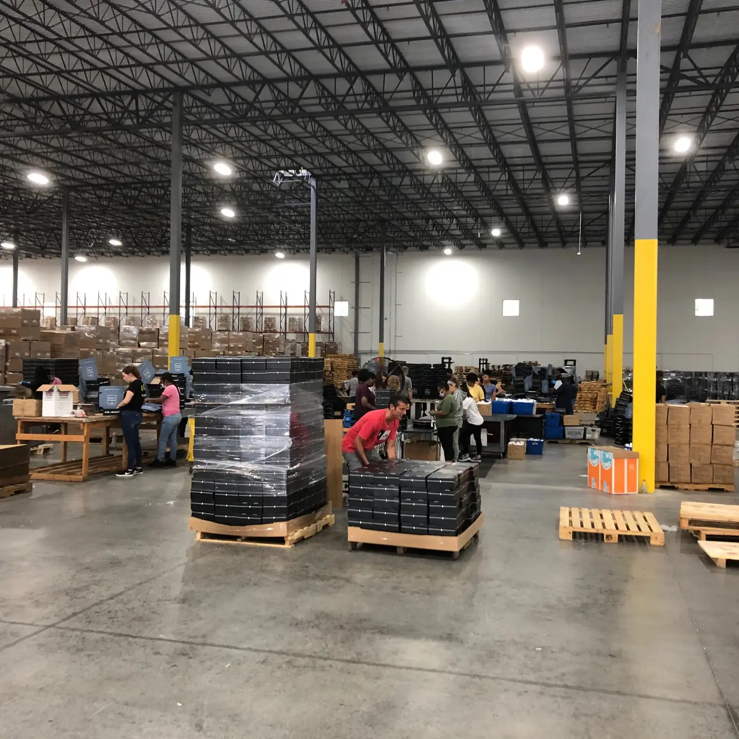 workers-revising-inventory-at-a-warehouse
